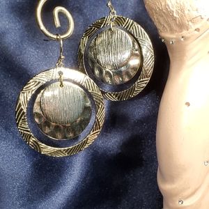 Silver toned earrings.